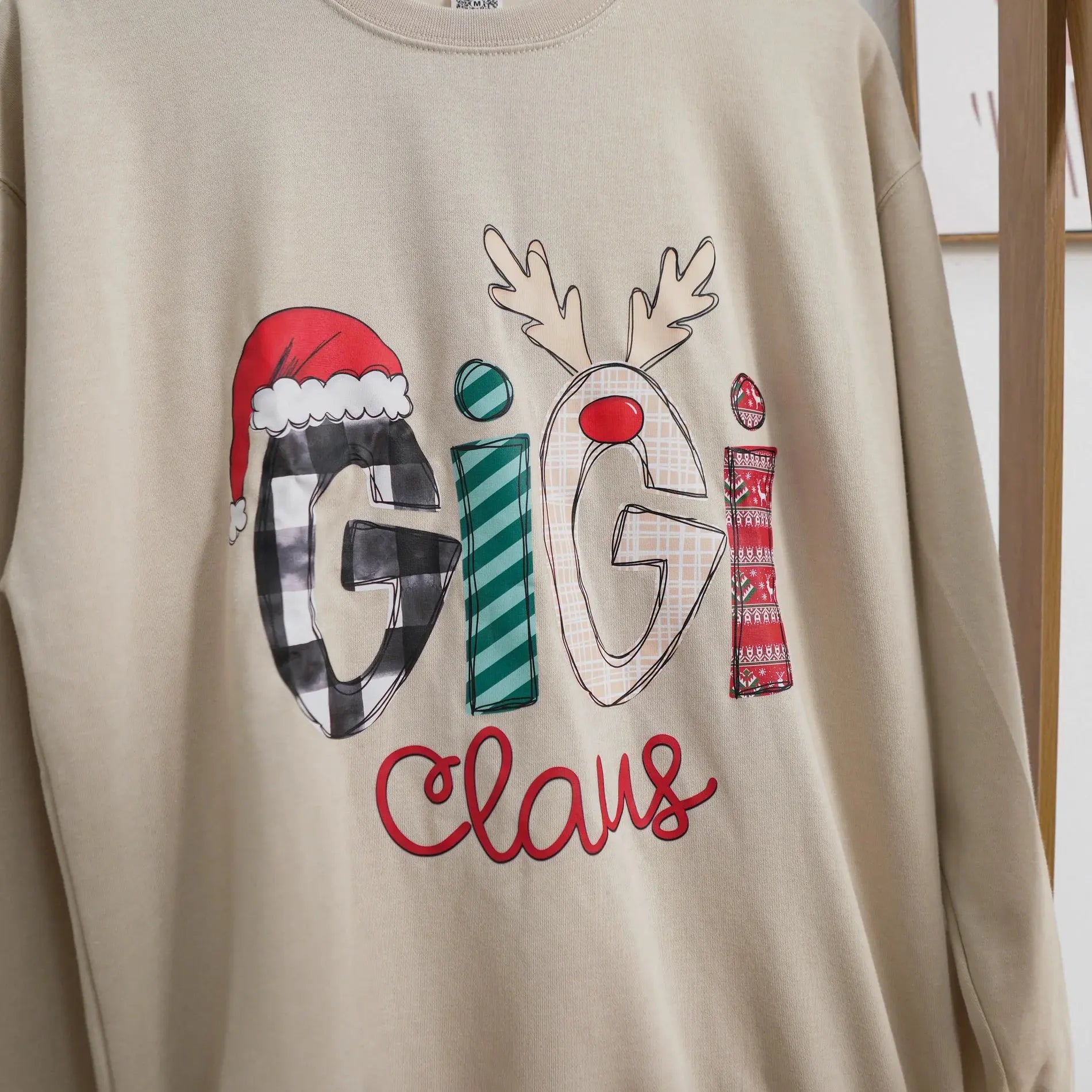 Custom Christmas Gigi Claus Sweatshirt , 2025 Christmas Nana Sweatshirt, Custom Grandma Claus Christmas Sweatshirt Printing Joy